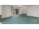 Bright living room with a sliding glass door, ceiling fan, and access to another room at 7844 N 17Th Ave, Phoenix, AZ 85021