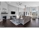 Spacious living room featuring a fireplace, high ceilings and an open layout at 9422 E Southwind Ln, Scottsdale, AZ 85262