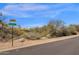 Street view showing dead end street sign and desert landscaping on a clear day at 9422 E Southwind Ln, Scottsdale, AZ 85262