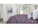 Bedroom featuring a queen-size bed with a private balcony at 9705 E Mountain View Rd # 1064, Scottsdale, AZ 85258