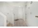 Bright foyer with tile flooring and staircase access to the upper level at 9705 E Mountain View Rd # 1064, Scottsdale, AZ 85258