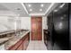 Kitchen with granite countertops, wood cabinets and modern appliances at 9705 E Mountain View Rd # 1064, Scottsdale, AZ 85258