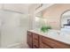 Modern main bathroom with double sink vanity and walk-in glass shower at 9705 E Mountain View Rd # 1064, Scottsdale, AZ 85258