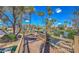 Beautiful pond featuring a charming bridge, lush landscaping, and scenic community views with palm trees at 9705 E Mountain View Rd # 1064, Scottsdale, AZ 85258