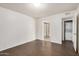 Spacious bedroom featuring laminate wood flooring, ensuite bath and laundry at 10610 S 48Th St # 1068, Phoenix, AZ 85044