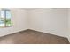 Bedroom with wood floors, natural light, and neutral paint at 10610 S 48Th St # 1068, Phoenix, AZ 85044