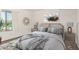 Comfortable bedroom with a decorative headboard, neutral tones, and a window for natural light at 10610 S 48Th St # 1068, Phoenix, AZ 85044