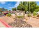 Desert Foothills Villas community sign with lush landscaping and mature trees at 10610 S 48Th St # 1068, Phoenix, AZ 85044