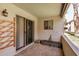 Relaxing patio featuring brick flooring, exterior storage, and sliding glass door for easy indoor/outdoor living at 10610 S 48Th St # 1068, Phoenix, AZ 85044