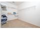 Spacious walk-in closet with shelving and hanging space, providing ample storage at 12030 W Polk St, Avondale, AZ 85323