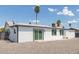 View of the backyard with a covered patio, and palm trees at 13202 N 40Th Pl, Phoenix, AZ 85032