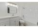 A bright bathroom features a large vanity and a tub and shower combo at 13202 N 40Th Pl, Phoenix, AZ 85032
