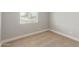 This bedroom features carpet, a window, and neutral paint at 13202 N 40Th Pl, Phoenix, AZ 85032