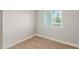 This bedroom features carpet, a window, and neutral paint at 13202 N 40Th Pl, Phoenix, AZ 85032