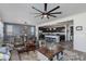 Spacious open-concept living room with a kitchen and dining area, perfect for entertaining at 14188 W Artemisa Ave, Surprise, AZ 85387