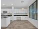 Open-concept dining area with granite countertop, stainless steel appliances, and ample storage at 15093 W Glenrosa Ave, Goodyear, AZ 85395