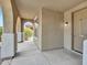 Inviting front porch showcasing a stylish entrance and well-kept landscaping at 15093 W Glenrosa Ave, Goodyear, AZ 85395