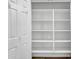 Spacious walk-in pantry offering ample storage with adjustable shelving at 15093 W Glenrosa Ave, Goodyear, AZ 85395