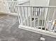 Detailed view of the carpeted stairs with white railings, adds safety and architectural interest at 15093 W Glenrosa Ave, Goodyear, AZ 85395