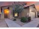 Inviting front entrance with a well-manicured lawn and a walkway leading to the front door at 15155 W Desert Hills Dr, Surprise, AZ 85379