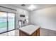 Bright kitchen with an island, sliding glass doors to the yard, and modern décor at 15155 W Desert Hills Dr, Surprise, AZ 85379