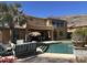 Sprawling backyard with pool, lush landscaping, and mountain views creating a desert oasis at 16401 S 29Th Dr, Phoenix, AZ 85045