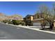 Inviting two-story home with a three car garage, mature landscaping, and mountain views at 16401 S 29Th Dr, Phoenix, AZ 85045