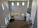 Grand foyer with soaring ceilings, elegant chandelier, and a curved staircase creating a wow-factor at 16401 S 29Th Dr, Phoenix, AZ 85045