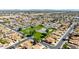 Wide aerial view of a neighborhood featuring green park space in a well-maintained community at 1705 E Juanita Ave, Mesa, AZ 85204