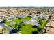Aerial community shot showcasing lush greenery and a pristine pool; a perfect blend of leisure and nature at 1705 E Juanita Ave, Mesa, AZ 85204