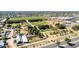 Aerial view of a farm venue offering outdoor activities and event space near residential areas at 1705 E Juanita Ave, Mesa, AZ 85204