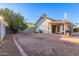 Backyard with patio, desert landscaping, and block wall at 1705 E Juanita Ave, Mesa, AZ 85204