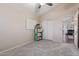 Neutral bedroom with closet, ceiling fan, and carpet at 1705 E Juanita Ave, Mesa, AZ 85204