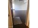Inviting entryway featuring a dark wooden door, tile flooring, and a glimpse into the living area at 1705 E Juanita Ave, Mesa, AZ 85204