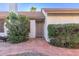 Front exterior view with a beautiful landscaped walkway leading to the decorative front door at 1705 E Juanita Ave, Mesa, AZ 85204