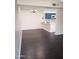 Open concept kitchen and living area featuring dark hardwood floors at 1705 E Juanita Ave, Mesa, AZ 85204