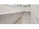 Walk-in closet with shelving and carpeted floor at 17633 W Palo Verde Dr, Litchfield Park, AZ 85340