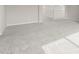 Living room featuring neutral walls and carpeted flooring at 17633 W Palo Verde Dr, Litchfield Park, AZ 85340
