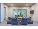 Cozy outdoor seating area with a lit fire pit and comfortable lounge chairs at 17962 W Elm St, Goodyear, AZ 85395