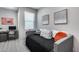 Cozy bedroom with a daybed, black bedding, and gray walls, providing a relaxing retreat at 17988 W Deneen Way, Surprise, AZ 85374