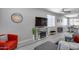Inviting living room with stylish decor, a modern fireplace, wood-look floors, and neutral tones that create a welcoming atmosphere at 17988 W Deneen Way, Surprise, AZ 85374