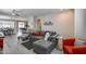 Open-concept living room showcases contemporary furnishings and bright, airy space at 17988 W Deneen Way, Surprise, AZ 85374