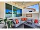 Stylish outdoor seating area on covered patio with ceiling fan and view of backyard at 17988 W Deneen Way, Surprise, AZ 85374