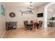 Inviting dining room featuring tiled floors and unique marlin wall decor, complemented by a stylish dining set at 1946 E Kings Ave, Phoenix, AZ 85022