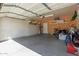 Spacious garage with overhead storage and ample room for vehicles and hobbies at 1946 E Kings Ave, Phoenix, AZ 85022