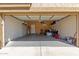Spacious garage with overhead lighting and ample room for vehicles and storage at 1946 E Kings Ave, Phoenix, AZ 85022