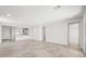 Bright and airy living space with recessed lighting, tile flooring, open layout, and views into the kitchen at 21292 N 270Th Dr, Buckeye, AZ 85396