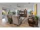Comfortable living room with neutral tones, ceiling fan, and outdoor access at 24270 N 173Rd Ave, Surprise, AZ 85387
