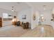 Inviting living room featuring plush chairs, carpet flooring and ample natural light at 24270 N 173Rd Ave, Surprise, AZ 85387