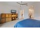 Bedroom features built-in storage and an ensuite bathroom at 24270 N 173Rd Ave, Surprise, AZ 85387